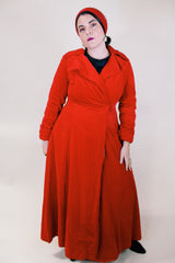 Women's vintage 1950's/60's Count Romi LTD., Your All Weather Traveler label long sleeve long length bright red velvet duster coat. One closure at waist.