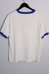 Men's or women's vintage 1970's Quality Sportswear Products, Made in USA label white ringer tee with blue trim and black graphic on the front.