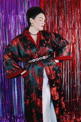 Women's or men's vintage 1990's NK label long sleeve long length black and red reversible robe smoking jacket in a thick silk material.