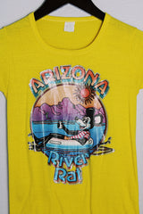 Women's or kids vintage 1970's short sleeve bright yellow tee with colored river rat graphic on the front in a polyester and cotton material.