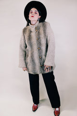 Women's vintage 1980's Lifestyle 80's by Andrea Ungar label long sleeve jacket with faux fur body in front and back and acrylic arms. Buttons up the front with side pockets.