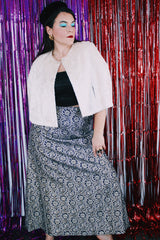 Women's vintage 1970's short length white furry faux fur white poncho sweater. Has button closure in the front and slits for arms