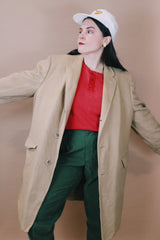 Men's or women's vintage 1960's Cashmere Deluxe Exclusively For Baskin label size large long sleeve long length tan camel colored cashmere coat with button closure.