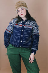 Women's or men's vintage 1970's Norway Handknitted label size large navy blue Norwegian style button up wool cardigan with all over white and red print