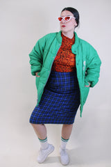 Men's or women's vintage 1980's King Louie Pro Fit, Made in USA label long sleeve kelly green puffer jacket with zipper and popper buttons up the front.