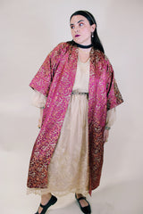 Women's vintage 1970's long sleeve long length maroon colored kimono robe jacket. Gold all over print. Front pockets and comes with matching tie belt.