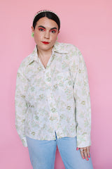 Men's or women's vintage 1970's Sutton Place label long sleeve button up shirt in white with all over green floral print.