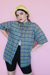 Men's or women's vintage 1980's Marc David Clothing label short sleeve button up collared shirt in a blue and green plaid print.