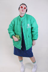 Men's or women's vintage 1980's King Louie Pro Fit, Made in USA label long sleeve kelly green puffer jacket with zipper and popper buttons up the front.