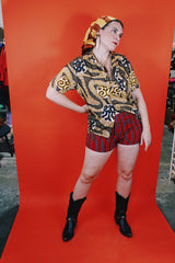 Women's or men's vintage 1970's Aloha Authentic Hand-Screened Originals label short sleeve Hawaiian print button up collared shirt in yellow, white, and brown colors.