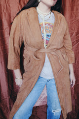 Women's vintage 1970's Joseph Magnin label long length long sleeve camel brown tan colored suede open front jacket.