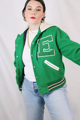 Women's vintage 1989 Nelson's Jacket, Portland, Oregon label bright green wool varsity letterman jacket with white trim. Has snap buttons, patches, pockets, and a hood. Shop more vintage outerwear and sportswear at Live Forever Vintage.