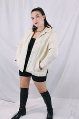 Women's vintage 1960's Custom Made Genuine Native Deerskin label long sleeve cream colored leather jacket. Fully lined, side pockets, and leather covered buttons.