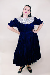 Women's vintage 1970's crushed blue velvet dress with cream embroidery peter pan collar. Short sleeves and ankle length.
