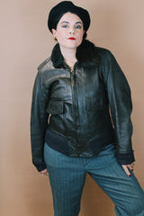 Men's vintage 1960's Jacket, Flyer's, Intermediate Type G-1 (from the Vietnam War) size medium chocolate brown zip up bomber leather jacket with faux fur trim collar.