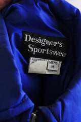Men's or women's vintage 1980's Designer's Sportswear label long sleeve bright blue colored nylon material puffer jacket with side pockets.