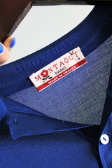 Men's or women's vintage 1980's Montagut Paris, Made in France label long sleeve navy blue polo top with a collar and half button closure in a slinky lightweight polyester material.