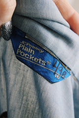 Women's vintage 1970's JCPenney Plain Pockets label long sleeve light blue chambray denim button up top with white applique trim and large graphic of mouse on back