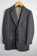 Men's vintage 1960's Nordstrom, Harris Tweed, Tailored in the USA label long sleeve button up blazer in a blue wool material. Fully lined and has brown leather buttons