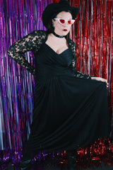 Women's vintage 1980's Made in USA label long sleeve ankle length black dress made with Polyester material.