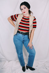 Women's vintage 1990's BB Dakota Leatherwear label light tan colored suede leather vest with fringe detail and silver buttons