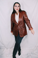 Men's or women's vintage 1980's Adler, Leather MFG. CO., Made in California label brown leather blazer jacket with front pockets and two button closure.