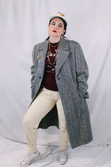 Men's vintage 1970's Metropole Monarch, Man's Shop San Francisco label long length long sleeve black and cream wool chevron trench coat with brown wood buttons.