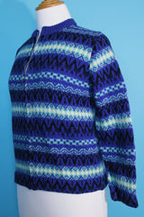 Women's vintage 1970's long sleeve printed zip up sweater in different shades of vibrant blue in a soft wool material. Norwegian style.