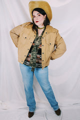 Men's or women's vintage tan colored long sleeve suede jacket by JCPenney. Popper buttons and contrast stitching and fully lined.