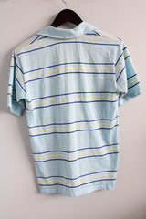 Women's or men's vintage 1980's Campus Pro Action label short sleeve light blue striped polo tee with half button closure and collar.