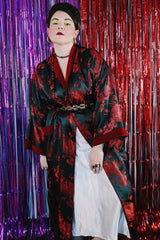 Women's or men's vintage 1990's NK label long sleeve long length black and red reversible robe smoking jacket in a thick silk material.