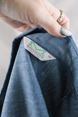 Women's vintage 1970's Maverick, Made in USA label long sleeve light blue chambray button up blouse with a western style.