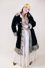 Women's vintage 1960's Glensea Fabric Expressly for North Bay by Glenoit, Union Made label long sleeve long length faux fur coat in brown and tan with toggle buttons.