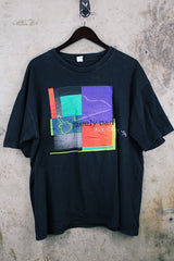Women's or men's vintage 1996 Made in El Salvador label short sleeve black Steely Dan tour tee with multicolored graphic on front and back.