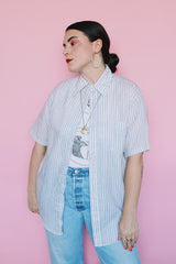 Men's or women's vintage 1970's Towncraft, Penneys label short sleeve white button up shirt with pink, yellow, and grey thin vertical stripes and one left chest pocket.