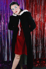 Women's vintage 1950's Consumer's Protection Label, BDW, Manufactured Under Fair Labor Standard label long sleeve long length black velvet hooded duster jacket.