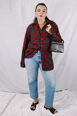 Men's or women's vintage 1980's Pendleton label long sleeve button up shirt in an all over red plaid print. Lightweight wool material, tortoise buttons.