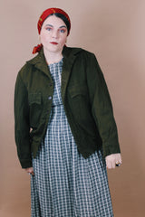 Men's vintage 1950's Caleb V. Smith & S, New York label size large dark green wool cropped fit long sleeve button up jacket with brown shearling liner.