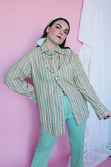 Men's or women's vintage 1960's The Crescent Spokane, Gant Shirtmakers label long sleeve cotton material button up shirt with yellow, green, and peach vertical stripes.