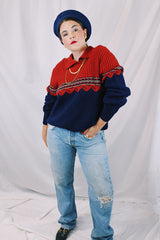 Men's or women's vintage 1970's Kingsport label long sleeve pullover sweater in burnt orange and navy. Built on matching collar. Soft acrylic material.