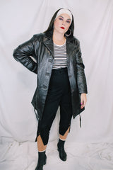 Women's vintage 1980's Leather King label long sleeve dark chocolate brown long length leather coat with button front closure and matching tie belt.