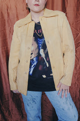 Women's or men's vintage 1970's Styled by Scully in Los Angeles long sleeve long length tan camel colored leather jacket with leather buttons up the front.