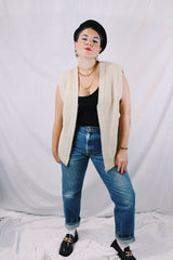 Men's or women's vintage 1970's Norsewear, Made in New Zealand label sleeveless zip up wool material vest in an oatmeal cream color. Ribbed texture all over.
