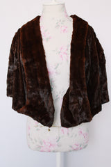 Women's vintage 1960's brown colored genuine fur stole lightweight jacket. Fully lined with an open front.