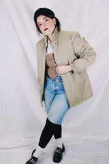 Men's or women's vintage 1970's Sir Jac label long sleeve grey colored longer length zip up bomber jacket with knit ribbed trim.