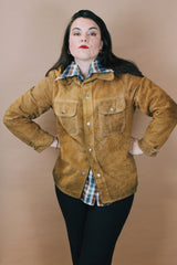 Men's or women's vintage 1970's Genuine Leather label size medium long sleeve light tan brown suede western style jacket with popper buttons.