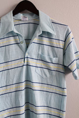 Women's or men's vintage 1980's Campus Pro Action label short sleeve light blue striped polo tee with half button closure and collar.
