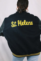 Men's or women's vintage 2000's Settlemein's, Portland, Oregon label long sleeve black varsity letterman jacket with yellow trim.