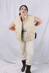 Women's or men's vintage 1970's A & M Industries, Seattle, Washington label sleeveless zip up puffer vest. Cream colored exterior, brown colored interior.