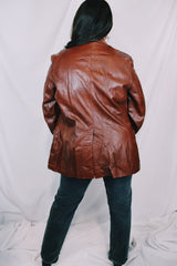 Men's or women's vintage 1980's Adler, Leather MFG. CO., Made in California label brown leather blazer jacket with front pockets and two button closure.
